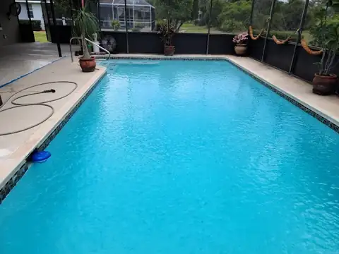 Sparkling turquoise residential pool freshly serviced in Lakeland